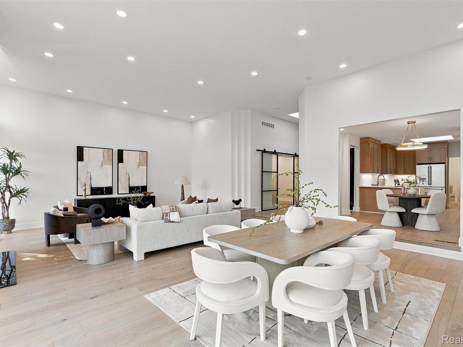 Dining & kitchen staged by Vivid at 1756 Alexander Dr, Bloomfield Hills