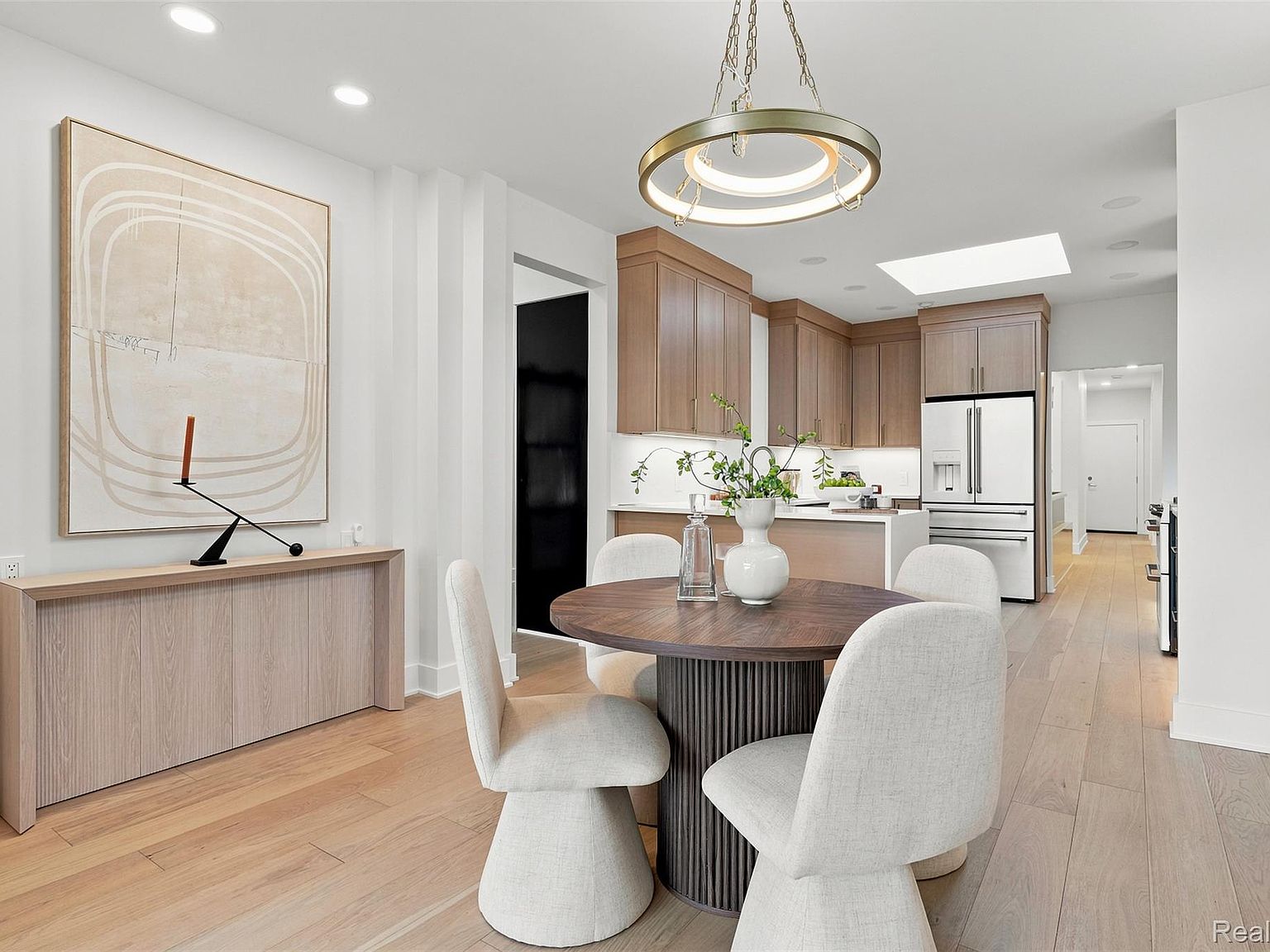 Staged kitchen and dining area